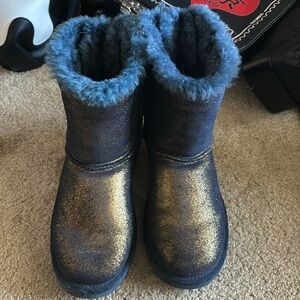 Ugg gold and gem incrusted boots with bow detials